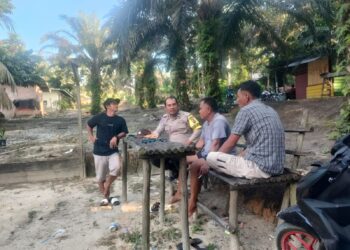 Bhabinkamtibmas Langgam Sambangi Warga, Ingatkan Bahaya Narkoba hingga Karhutla