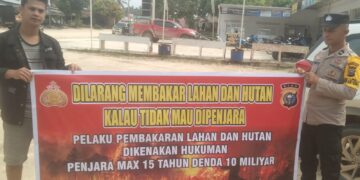 Polsek Langgam Sosialisasikan Larangan Bakar Hutan kepada Warga Desa Segati