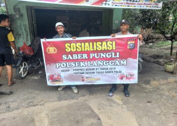 Polsek Langgam Sosialisasikan Saber Pungli di Pasar Segati, Warga Diimbau Tolak Pungutan Liar