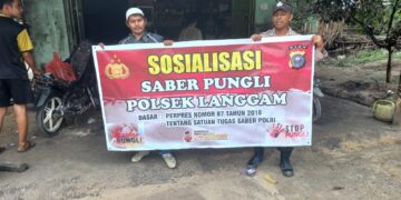 Polsek Langgam Sosialisasikan Saber Pungli di Pasar Segati, Warga Diimbau Tolak Pungutan Liar
