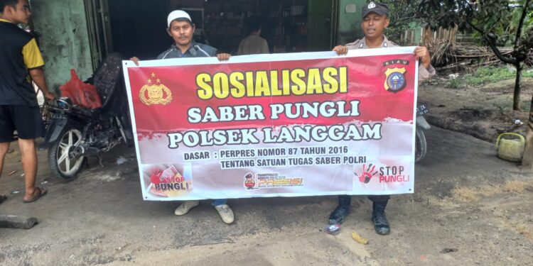 Polsek Langgam Sosialisasikan Saber Pungli di Pasar Segati, Warga Diimbau Tolak Pungutan Liar