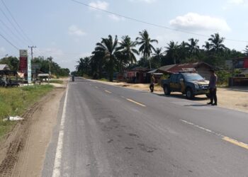 Polsek Pangkalan Lesung Laksanakan Pengaturan Lalu Lintas di Jalur Rawan Kecelakaan