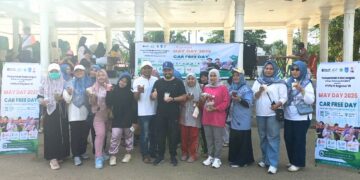 Peringati Hari Buruh di Car Free Day, PTPN IV Regional VI Bersama Disnaker Kota Langsa Bagi Aneka Bubur Gratis